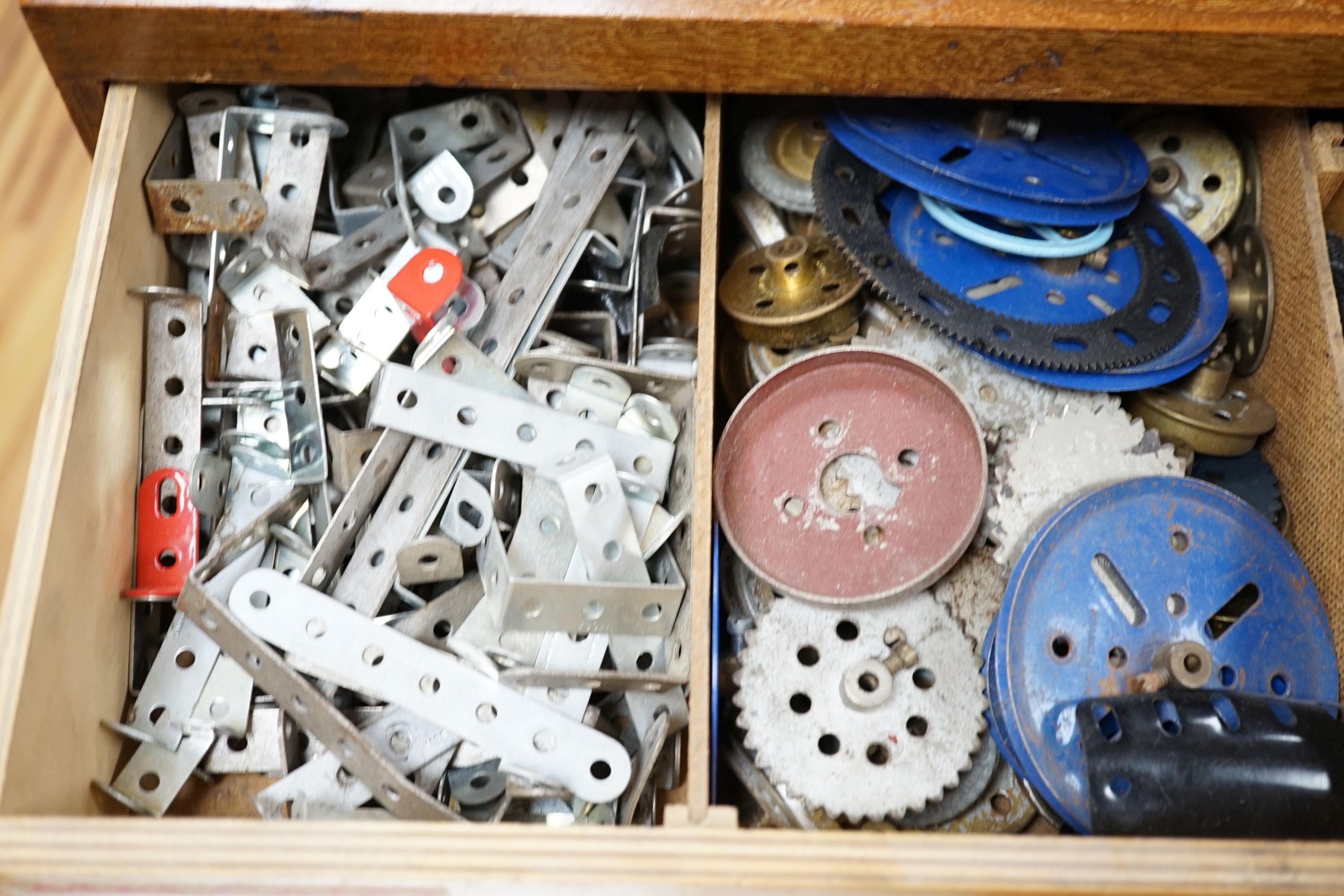 A large quantity of post-war Meccano, housed in a five drawer chest, 53cm wide